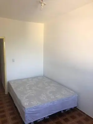 Uma cama ou camas num quarto em Condomínio Eliliane - Cobertura em Canto Grande