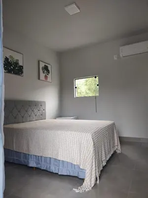 Uma cama ou camas num quarto em Morada Stucchi