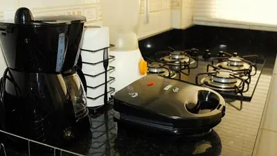 A cozinha ou kitchenette de 1045 - Apartamento no centro de Bombinhas a 50mts do mar
