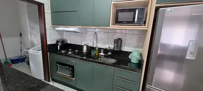 A cozinha ou kitchenette de Casa Praia Itapema - Sobrado 3 quartos