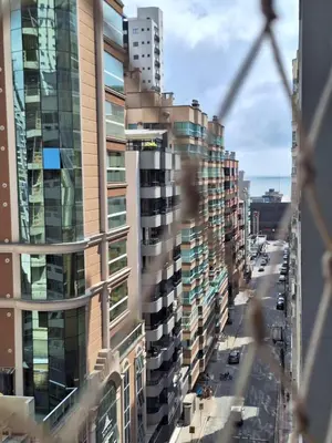 Uma vista geral de Itapema ou a vista da cidade a partir do apartamento