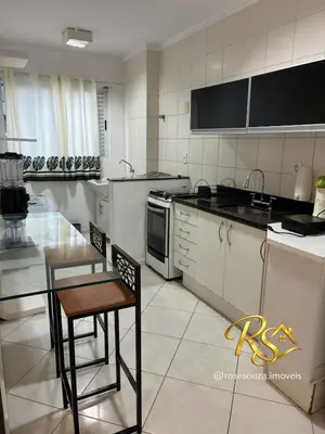 A cozinha ou kitchenette de Ótimo apartamento de 2 quartos 2 bwcs em itapema meia praia - Aluguel de Temporada