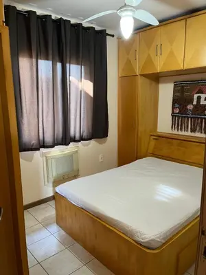 Uma cama ou camas num quarto em apartamento na praia de Porto belo - SC