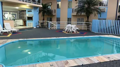 A piscina em ou perto de apartamento na praia de Porto belo - SC