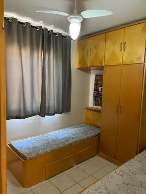 Uma cama ou camas num quarto em apartamento na praia de Porto belo - SC