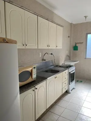 A cozinha ou kitchenette de apartamento na praia de Porto belo - SC