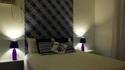 Uma cama ou camas num quarto em Pousada Narinari