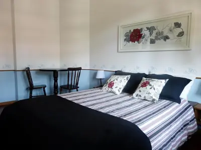 Uma cama ou camas num quarto em Pousada Narinari