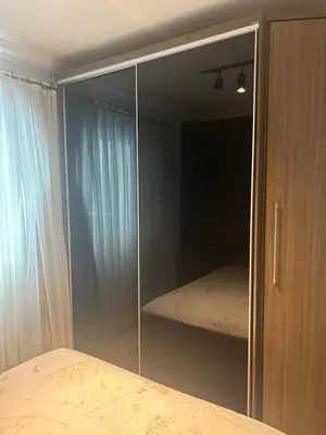 Uma cama ou camas num quarto em Apartamento para alugar na temporada a 150m do mar