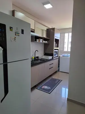 A cozinha ou kitchenette de Apartamento em Bombinhas Próximo ao centro e Passarela do Ribeiro