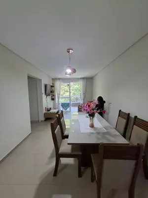 Uma área de estar em Apartamento em Bombinhas Próximo ao centro e Passarela do Ribeiro