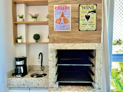 A cozinha ou kitchenette de Apartamento Bella Palmas - 190m da Praia de Palmas
