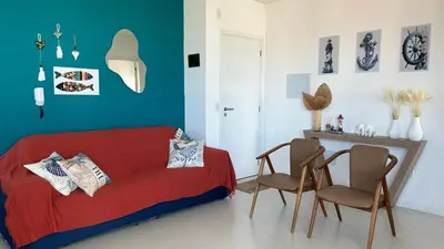 Uma área de estar em Apartamento Bella Palmas - 190m da Praia de Palmas