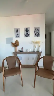 Uma área de estar em Apartamento Bella Palmas - 190m da Praia de Palmas