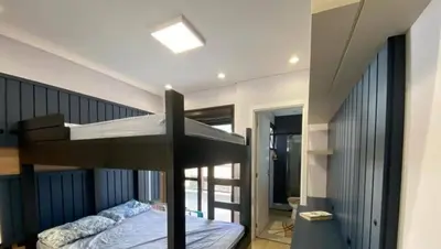 Uma cama ou camas num quarto em Cobertura Palmas