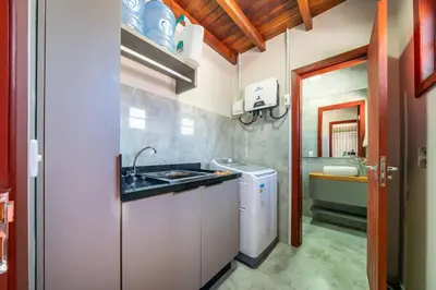 A cozinha ou kitchenette de A88 - Casa frente mar no centro de Bombinhas.