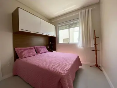Uma cama ou camas num quarto em Miss Sarajevo Praia Palmas Governador Celso Ramos