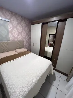 Uma cama ou camas num quarto em Casa aconchegante em Governador Celso Ramos - Nazário