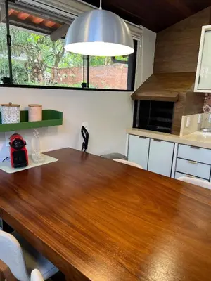 A cozinha ou kitchenette de Casa pé na areia em praia paradisíaca com piscina frente mar