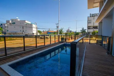 A piscina em ou perto de Brisas do Sul 102 - Apto 2 quartos - 150 metros da Praia do Mariscal!