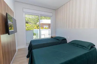 Uma cama ou camas num quarto em Varandas do Atlântico 502A – Frente Mar em Bombas