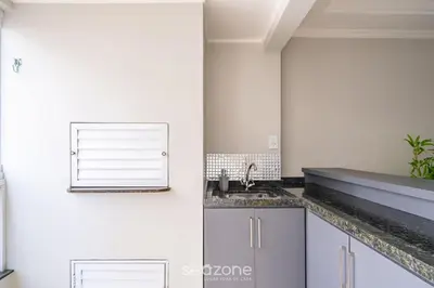 A cozinha ou kitchenette de Apto a 60m do mar - Meia Praia Itapema OBS0301