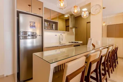A cozinha ou kitchenette de Aconchegante Apartamento para Famílias na Praia de Bombinhas - Centro