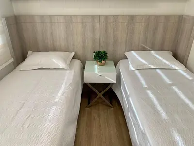 Uma cama ou camas num quarto em Varandas do Atlântico - O seu paraíso à beira mar