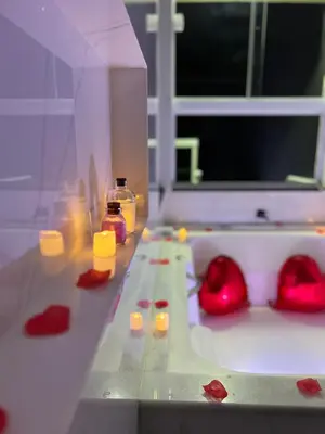 Uma cama ou camas num quarto em Casa com banheira