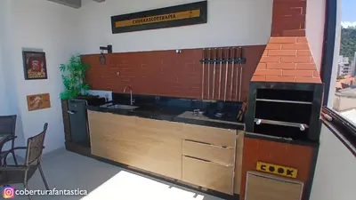 A cozinha ou kitchenette de Cobertura fantástica apenas 70 metros da praia