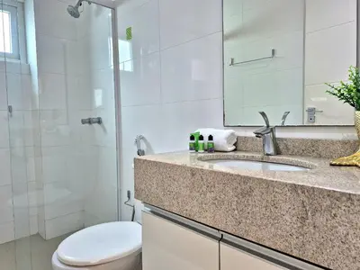 Uma casa de banho em Portinari Charmoso Área Gourmet 3 Q |CURTA192