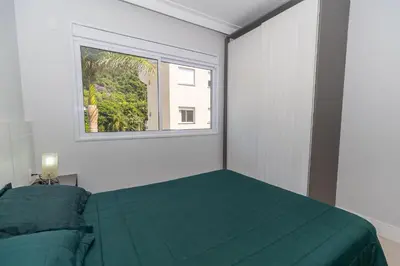 Uma cama ou camas num quarto em Varandas do Atlântico 304A – Frente Mar em Bombas