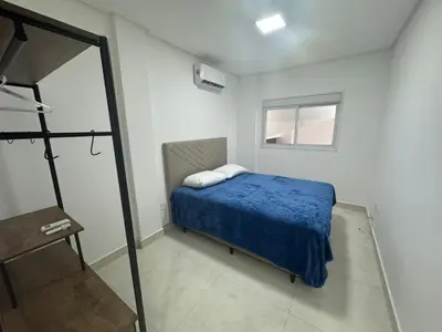 Uma cama ou camas num quarto em A66 - Carmel - Apto 102