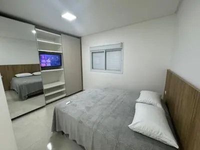 Uma cama ou camas num quarto em A66 - Carmel - Apto 102