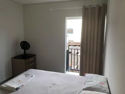 Uma cama ou camas num quarto em Apto 70m² no centro de Porto Belo