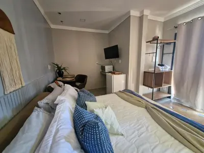 Uma cama ou camas num quarto em Balneário Camboriú - SUÍTE PRIVATIVA EXECUTIVA Suíte Shamá