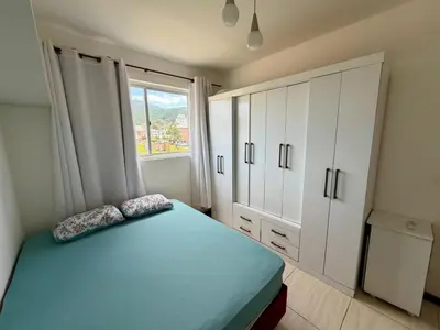 Uma cama ou camas num quarto em Apartamento na linda Praia Palmas SC 3