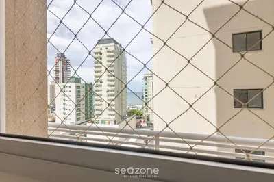 Uma vista geral de Itapema ou a vista da cidade a partir do apartamento