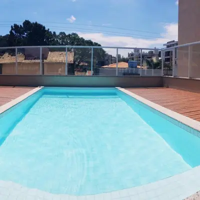A piscina em ou perto de Apartamento Veraneio em Bombinhas