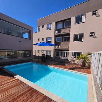 A piscina em ou perto de Apartamento Veraneio em Bombinhas
