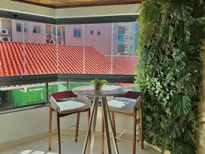 Uma varanda ou terraço em Apartamento 70m da praia em Bombinhas