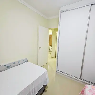 Uma cama ou camas num quarto em Apto Caminho do Mar em Bombinhas