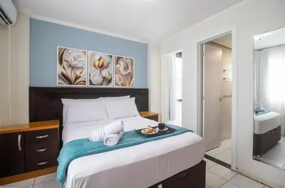Uma cama ou camas num quarto em DCA41 - Churrasq, Garagem, 3 DR Climatizados