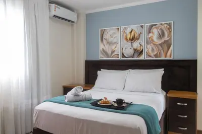 Uma cama ou camas num quarto em DCA41 - Churrasq, Garagem, 3 DR Climatizados