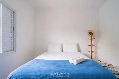 Uma cama ou camas num quarto em Casa 4Q c/ churrasq. 100m da praia JAT0355