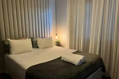 Uma cama ou camas num quarto em Vista Mar com Churrasqueira 2 Quartos |CURTA156
