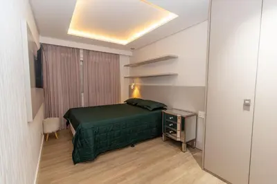 Uma cama ou camas num quarto em Varandas do Atlântico 101B – Frente Mar em Bombas