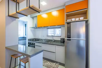 A cozinha ou kitchenette de Apto moderno a 800m da praia Itapema JZZ702
