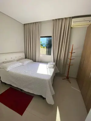 Uma cama ou camas num quarto em Casa com Piscina aquecida em Balneário Camboriú