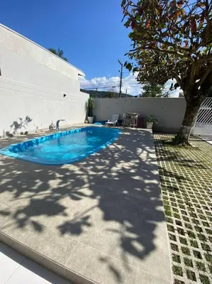 A piscina em ou perto de Casa com Piscina aquecida em Balneário Camboriú